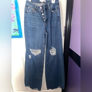 And Now This, size 25, wide leg, distressed blue jeans.